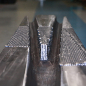 Reconstructed crossing using WA metal cored wire