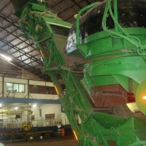 Exterior view of a sugar harvester showing primary extractor hood Exterior view of a sugar harvester showing primary extractor hood