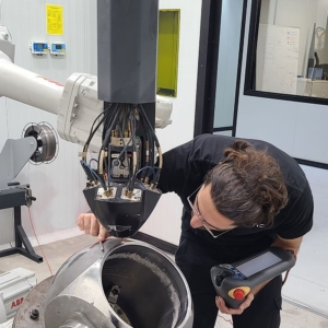 Precision cladding a ball valve with cored wired for laser and wear protection